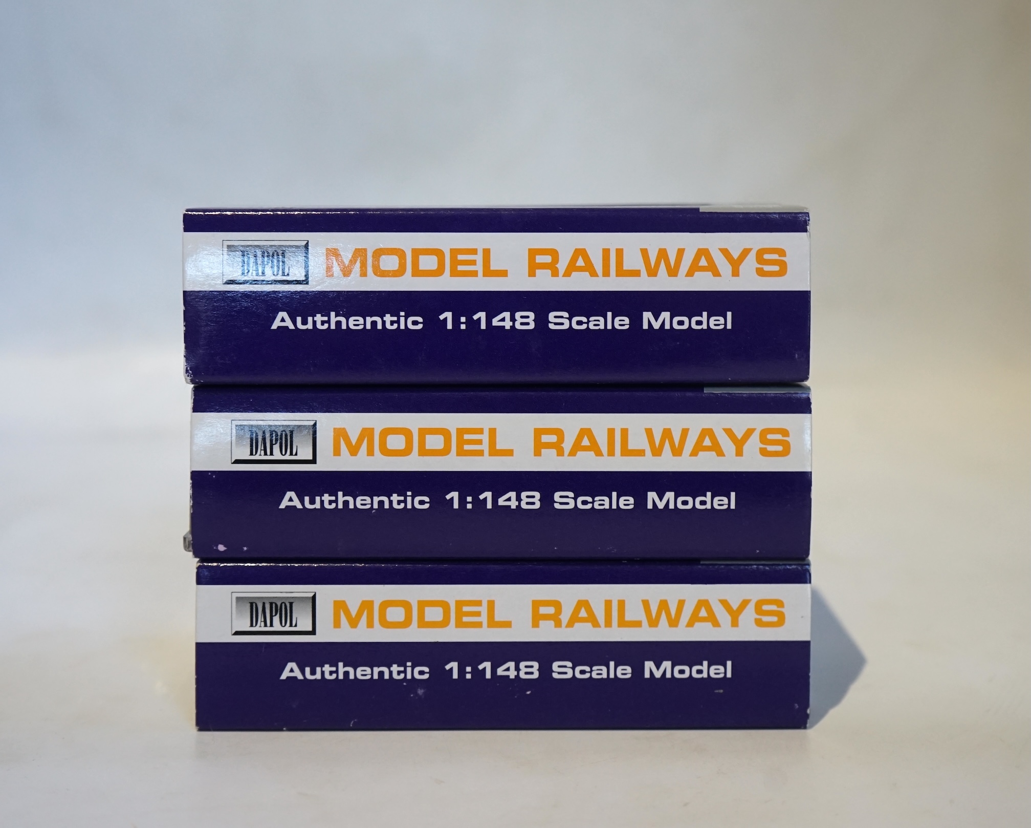 Three boxed Dapol N gauge railway BR tank locomotives; an Ivatt 2-6-2T, 41234 (ND-061A), a Class 45xx, 4571 (ND-024), and a Class 45xx, 4570 (ND-013). Condition - good.